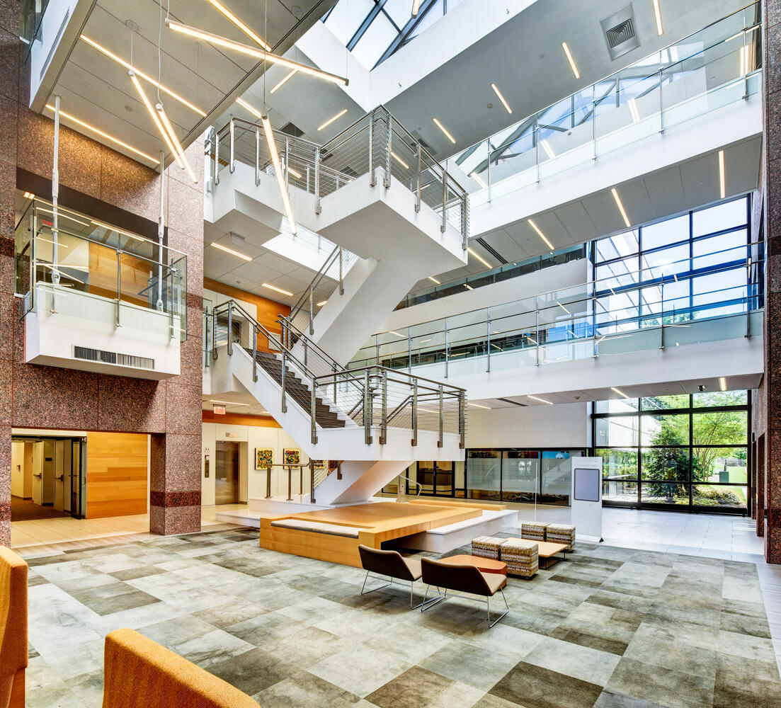 Interior lobby of 214 Carnegie Center featuring 3-level lobby and staircase.