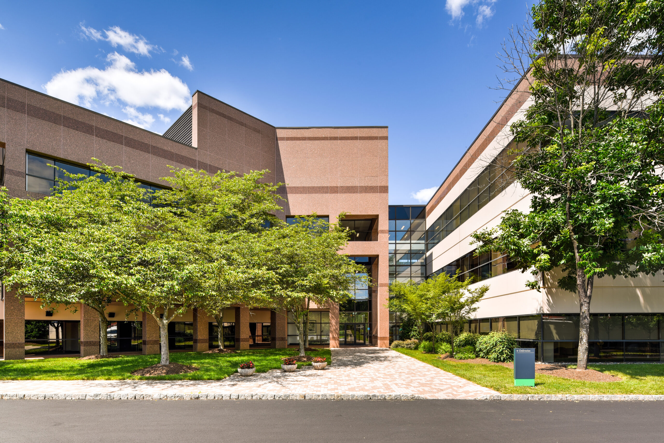 Exterior shot of an office building entrance.