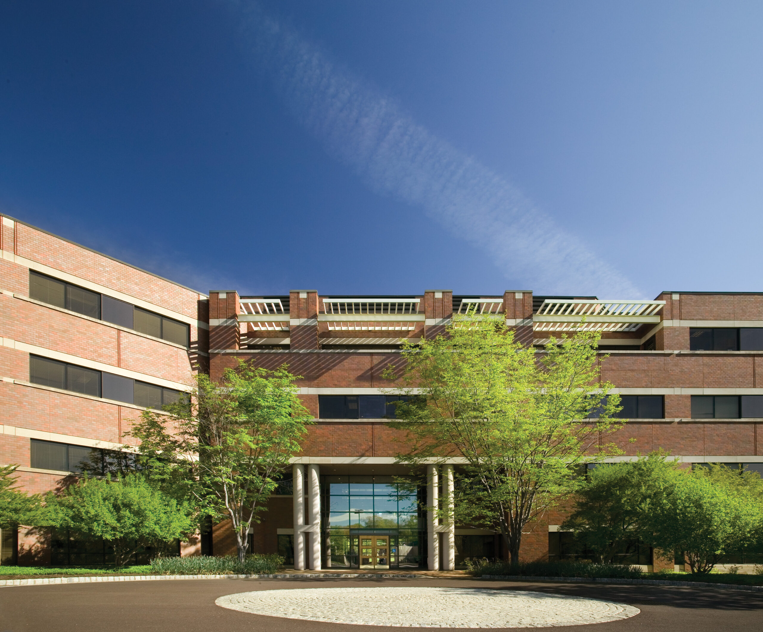 Exterior shot of the front of a brick building.